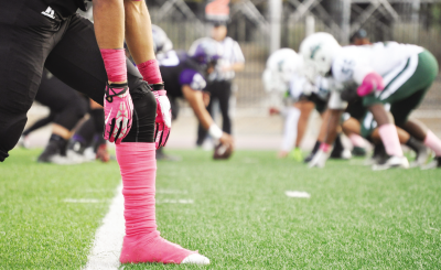 Players wear pink in support of Breast Cancer Awareness.