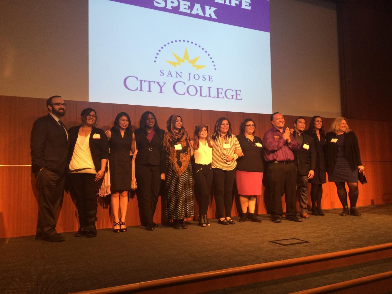 San Jose City College professor Chris Lancaster (far left) poses on stage with 'Life Speak' organizers Shelly Giacolone (second to right) and Leslyn McCallum (far right), as student speakers took their final curtain call before the audience in the downtown San Jose Adobe building Friday April 7.