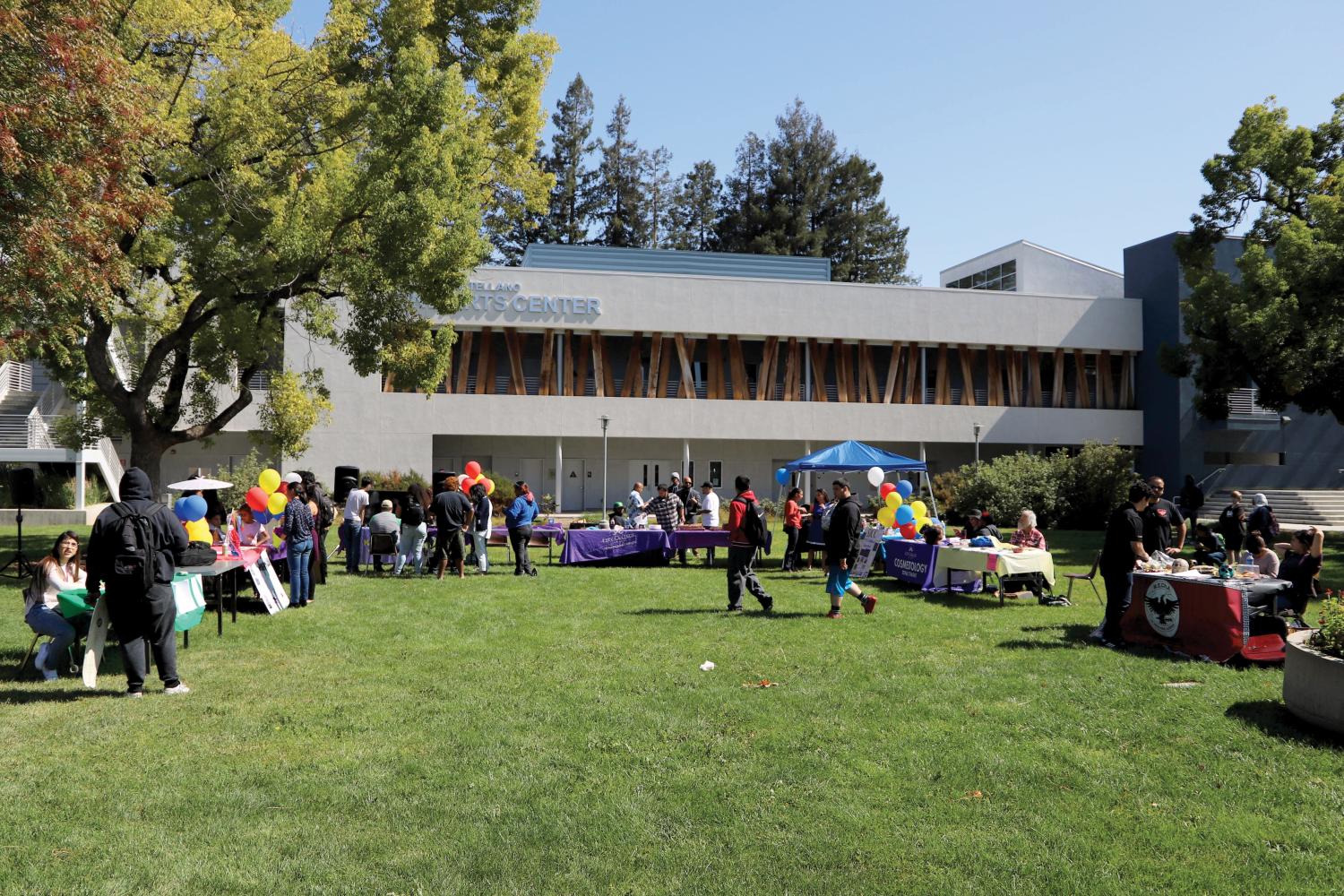 Club representatives sit at tables waiting for students to come up and get information during SJCC's Fall 2017 Club Day Oct. 4.