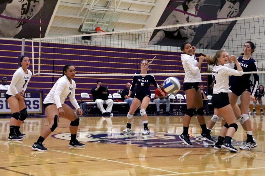 Kassandra Van Dyke (7) and Haile Landrum (9) watch helplessly as the ball gets past front blockers Jordyn Windom (5) and Sierra Choyce (8) and heads for the ground for a Gavilan point during the second set of the match Wednesday, Oct. 4.