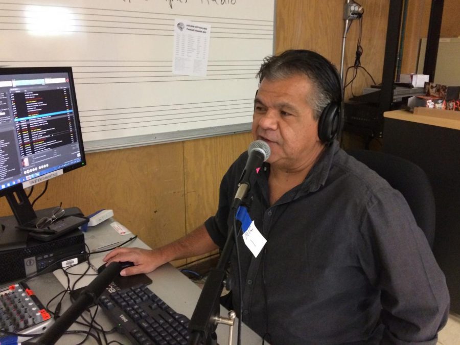 KJCC Station Manager Jeff Ochoa mans the mike in KJCC's temporary studio while its home in the Student Services Center continues to be renovated.