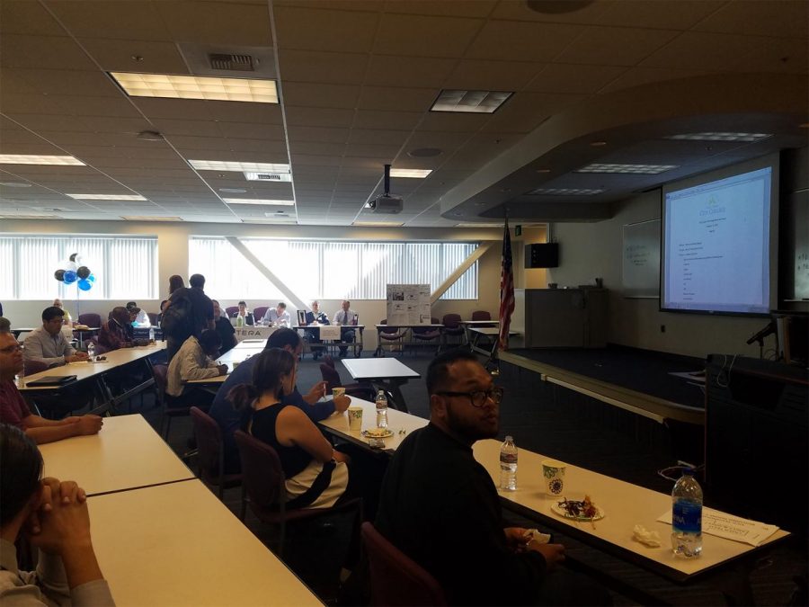 Laser tech conference meet and greet featured guest companies inside the Technology Center Oct. 12.