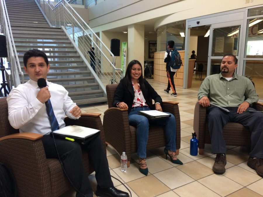 From left: Joseph Heady answers a question in a candidate forum for the student trustee special election, moderated by ASG President Iriana Luna, as candidate Jorge Casas awaits his turn, on Oct. 18 in the Student Services Center.