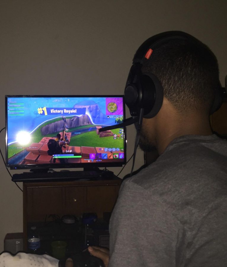 Artie Myers playing and winning a game of fortnite at his house on Wednesday, May, 2.