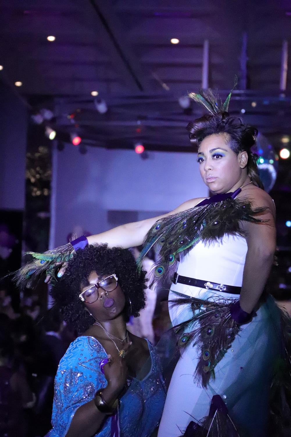 Freshman technician Jalecia Olden and her model Tashiona Morrow strike a pose at the end of the runway during the 2018 Spring Hair show held at the Glasshouse in down town San Jose on Friday, April 27.