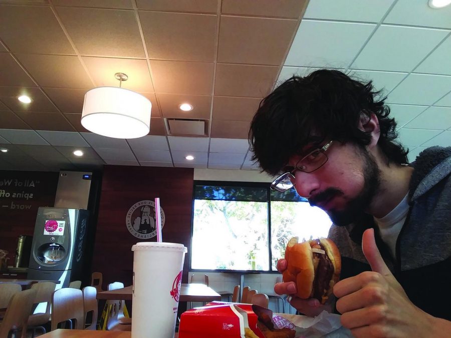 Times staff Kayne Gallegos at Wendys, eating a double stack, Step. 18.