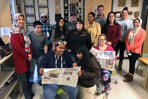 City College Times fall 2019 staff pose for a group shot in the newsroom.