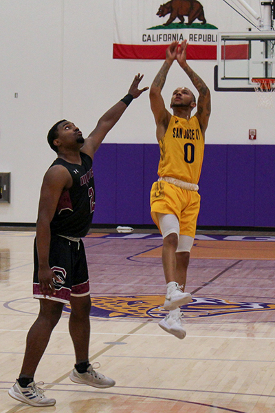 Point Guard DeCaurey Brown shooting from the three  point line against Monterey Peninsula College on Jan. 31.