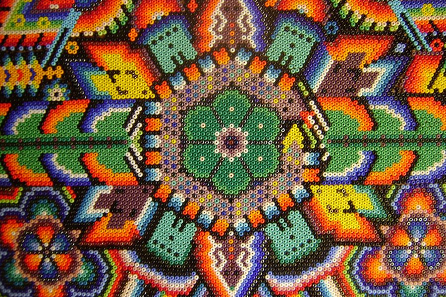 This beaded art peyote flower is an example of traditional Huichole folk art.
