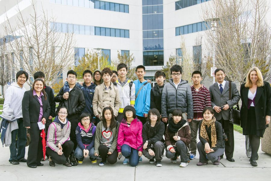 From the archives: From front left, international student counselor Doriann Tran poses for a group shot in front of the Tech Center on the SJCC campus with students visiting from Shanghai, China. 