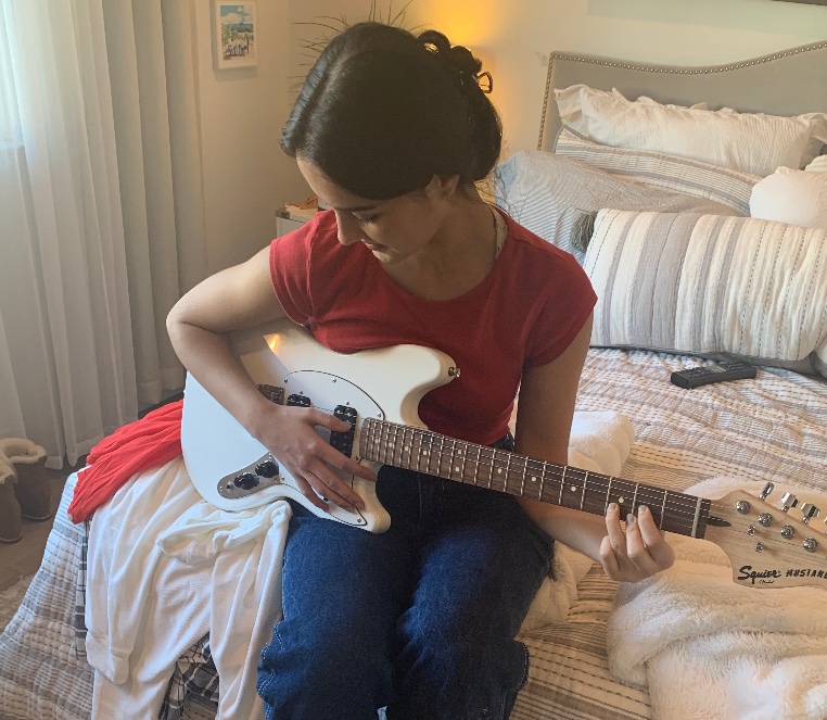 Isabella Morrison, an 18-year-old student at Milpitas High School and San Jose City College, plays her electric guitar at home, Wednesday, Sept. 9, 2020.