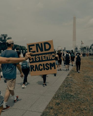People march towards the Washington Monument at the Black Lives Matter protest in Washington, D.C.

Photo by Clay Banks on Unsplash