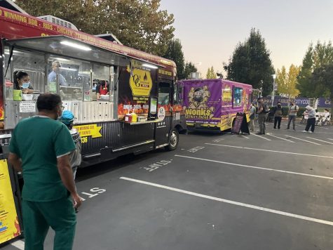 Students and faculty in Halloween costumes visit the food trucks at Fright Fest 2021 at SJCC on Oct. 28.