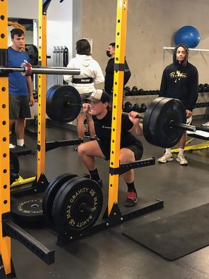 Jags punter Corbin Schaffer lifts 225 pounds at the Jaguars weight room on March 8.
