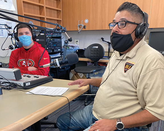 The Broadcasting 42 class received a double-dose of visits from real-life broadcasters on March 30. Indiana Al Breiten from San Joses country radio station KRTY (95.3 FM) was a special guest at the campus radio station KJCC. Breiten got his start at KJCC back in 1993. A re-broadcast of Breitens interview can be heard at www.kjcclive.com throughout the weekend of April 2-3.  Indiana Al Breiten with student radio engineer Gabe Cavarro