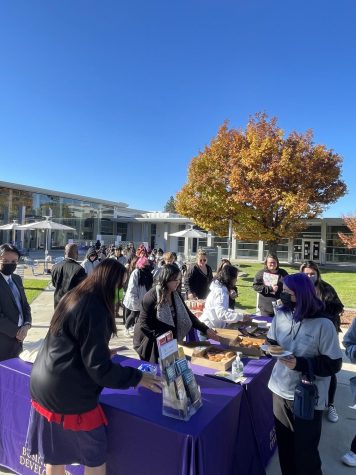 Jaguars line up for donuts and coffee on the Cosmetology Quad, on Nov. 16.