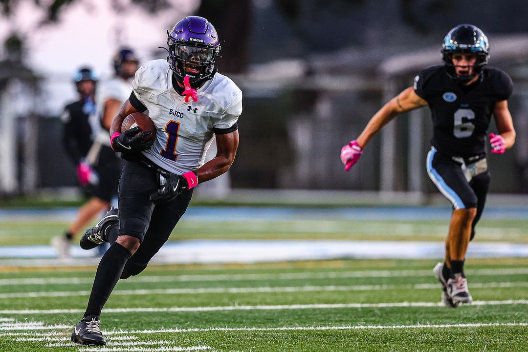 San Jose City College's junior wideout Jamir Shepard runs away from defenders vs Cabrillo College on Saturday, Oct. 5, 2024. 