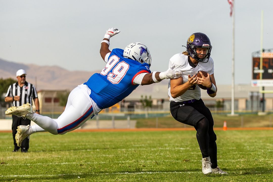 San Jose City College quarterback Will Augenstein breaks free of a Coalinga College Falcon defende en route to a double OT 50-48 victory in Coalinga, Calif. on Oct. 26, 2024.