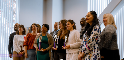 Attendees during the annual speech competition in the Tech Building pose for a photo. 