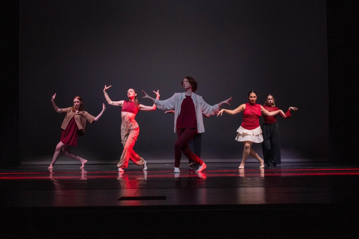 Members of SJCC’s dance team rehearsing “Die 4 U” on stage on Nov. 20,inside the campus theater.