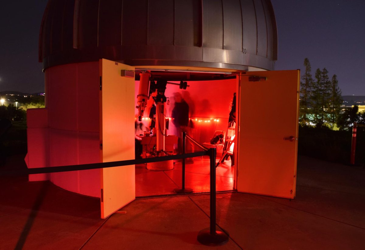 A person looks through a telescope in the observatory’s main dome during a public night on March 8, 2024.