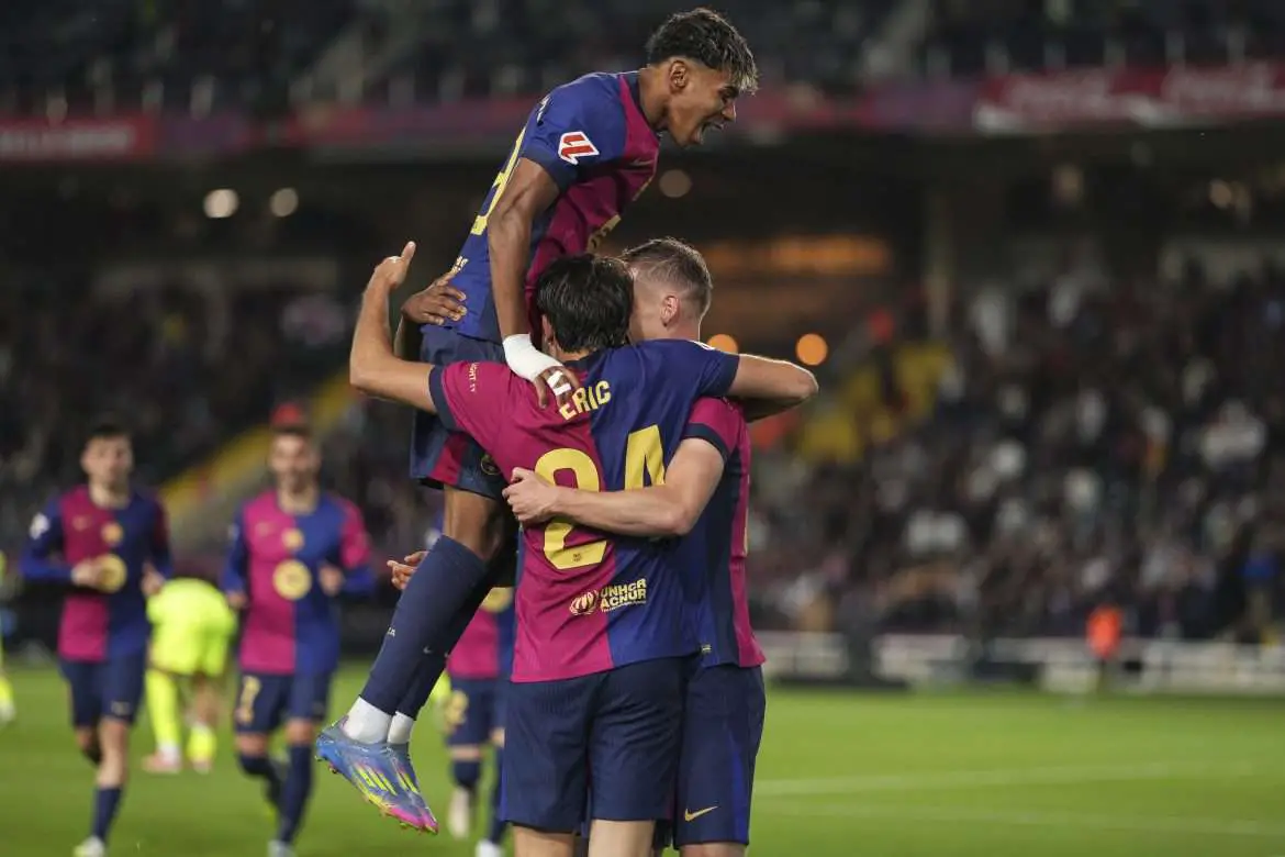 Barcelona players, from left to right Lamine Yamal, Eric Garcia and Dani Olmo celebrating the first goal during the match against Mallorca at Estadi Olimpic Lluis Companys on April 22, 2025, in Barcelona, Spain